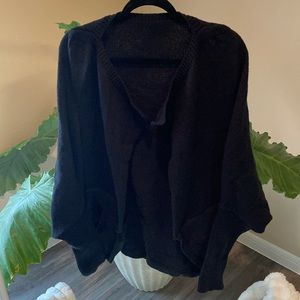 Tight fitted arm at bottom ballon top portion sweater with pockets!